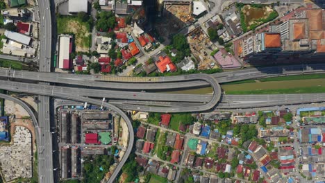 kuala lumpur city sunny day traffic road junction aerial topdown view panorama 4k malaysia