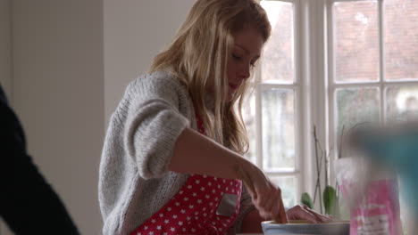 Woman-Mixing-Cake-Ingredients-In-Bowl-Shot-On-R3D