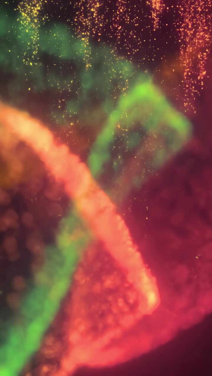 Sfondo astratto luminoso con particelle colorate dinamiche e vorticose.