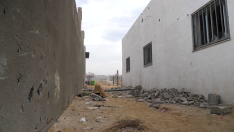 damaged house walls after gunfire, israel hamas war 2023