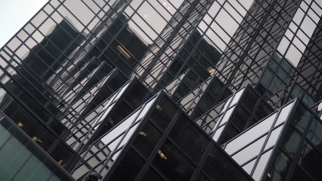 Aesthetically Pleasing, Futuristic looking building composed of Cubes made out of Black Glass in New York City.