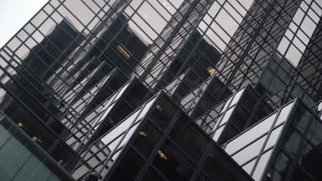 aesthetically pleasing, futuristic looking building composed of cubes made out of black glass in new york city.