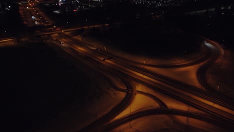 night aerial flight tracks sparse winter traffic on divided highway