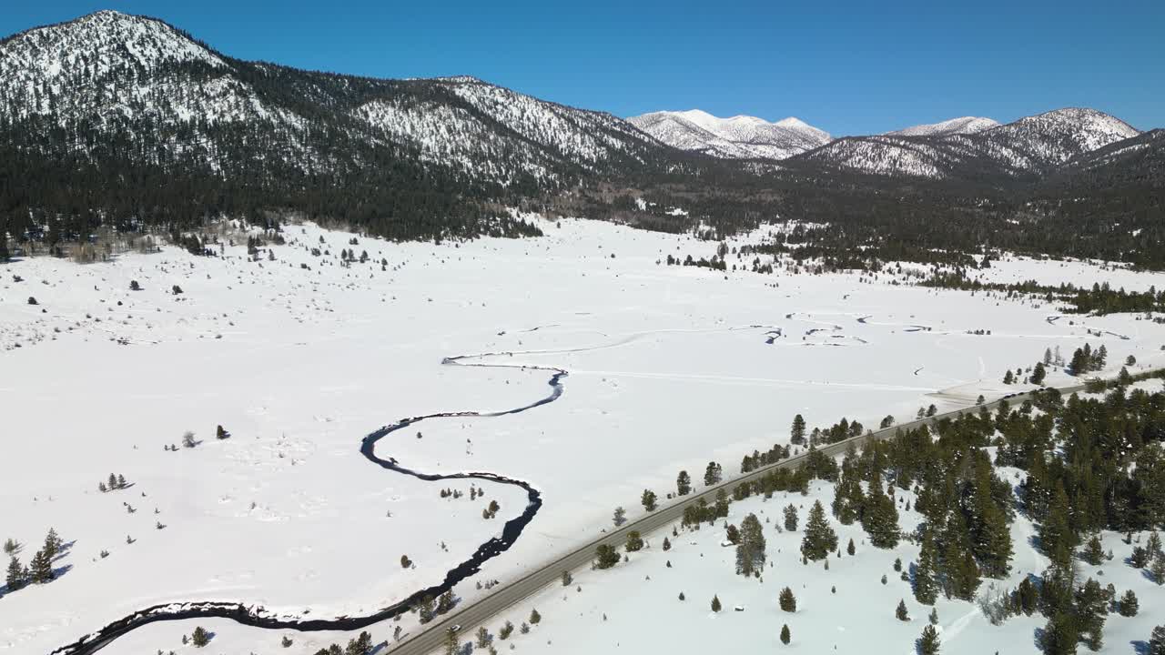 Aerial view of Sierra Nevada wilderness valley and stream