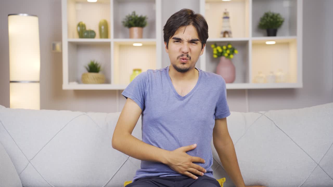 Man experiencing stomachache.