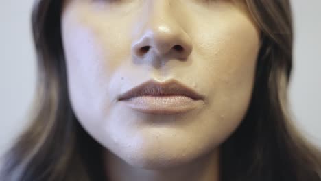 A-close-up-shot-of-a-Hispanic-female-saying-no-to-the-camera