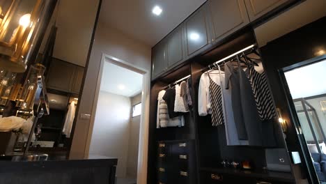 elegant wooden built walk- in closet decoration