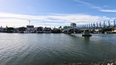 a bridge spanning a calm river