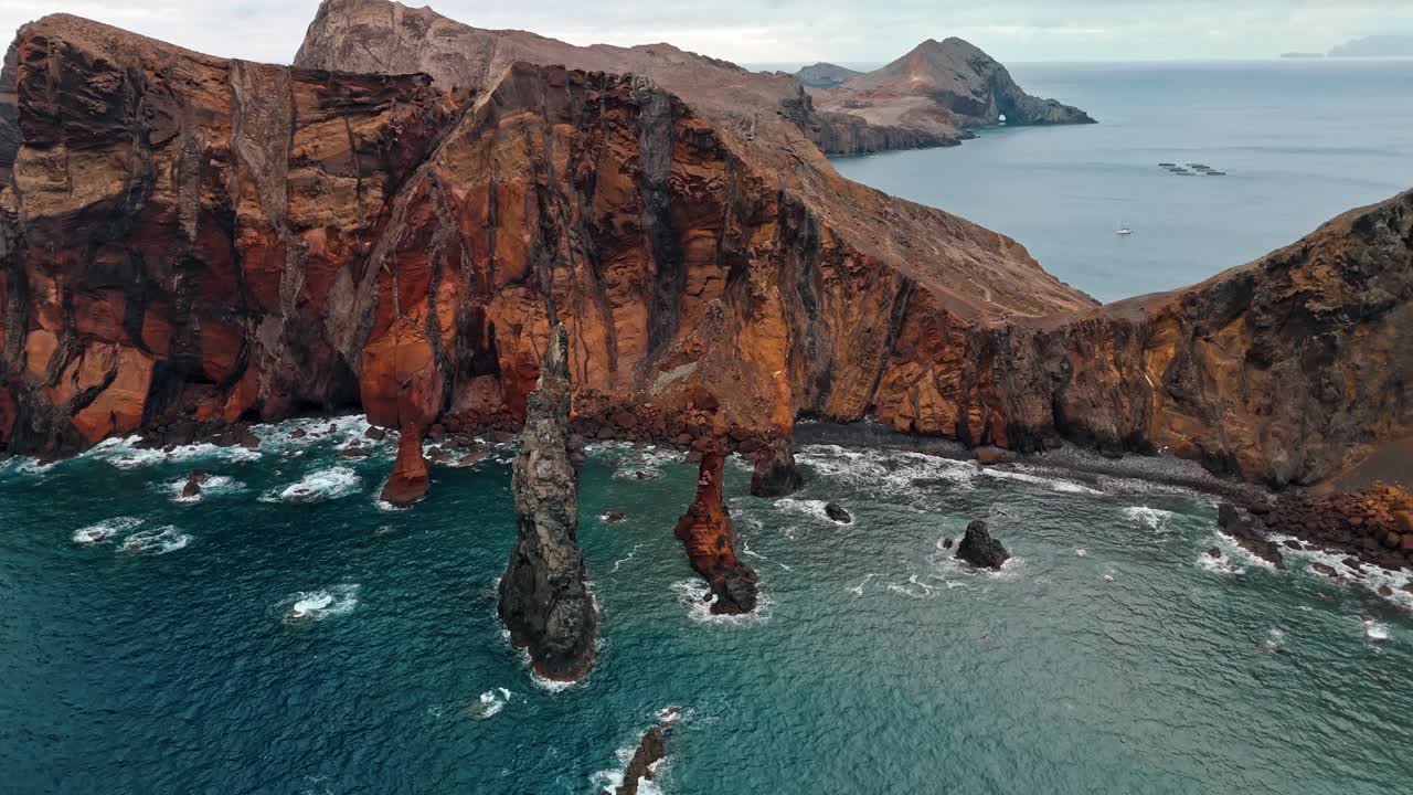 Aerial View of Dramatic Rocky Coastline and Ocean
