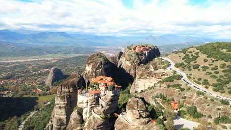 circling over meteora monastery in greece