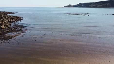 calm sea at runswick bay in yorkshire