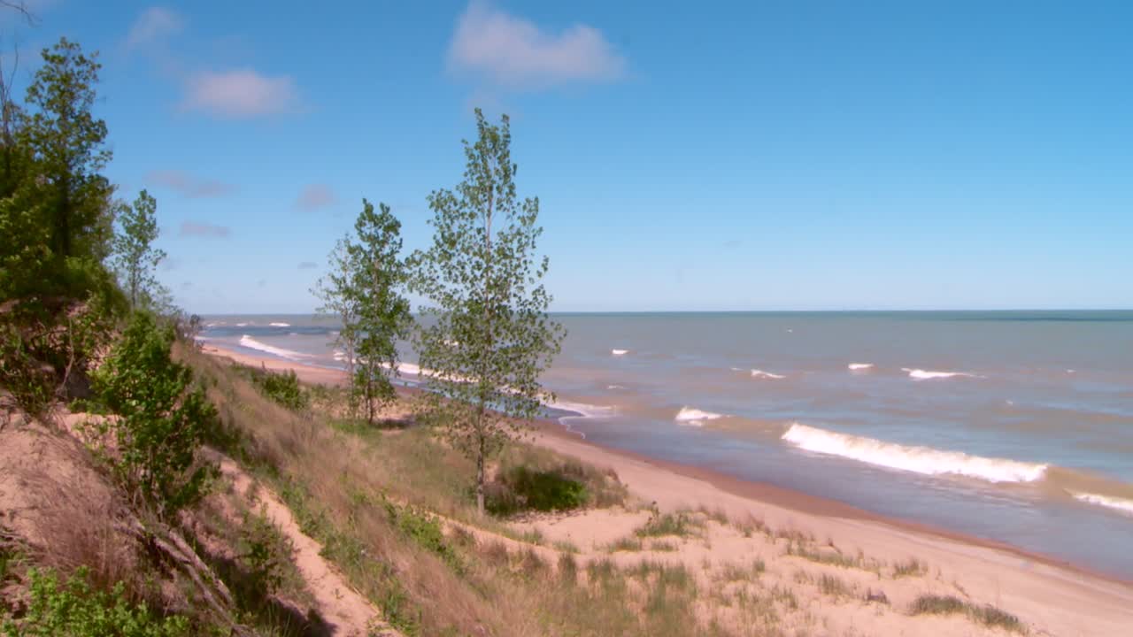 Reveal Beaches At Indiana Dunes National Park During Summer In The United States. Tilt-down Shot