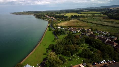 Drone-video-over-a-residential-area-on-the-outskirts-of-Yarmouth,-Isle-of-Wight