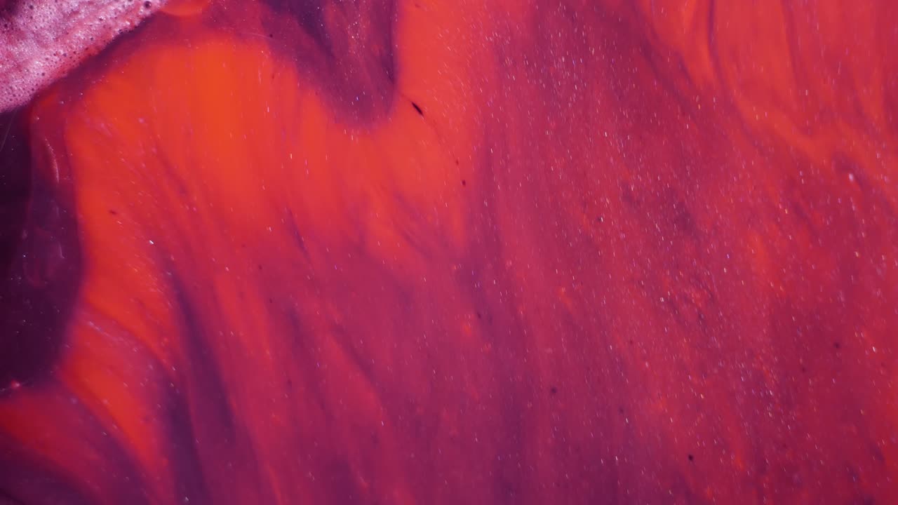 Abstract Fluid Art with Swirls of Red and Purple