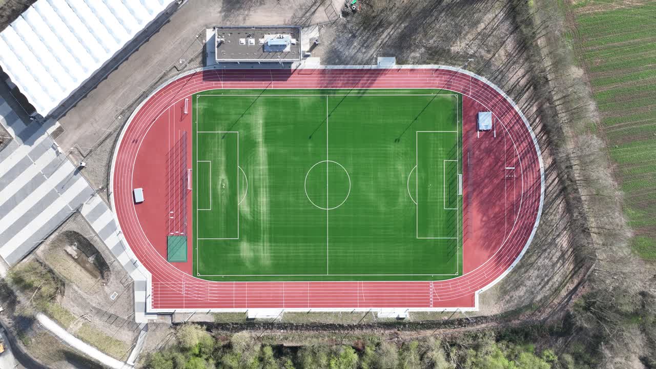 Sports field, atlethic track, soccer field, sports and leisure, recreation. Aerial view.