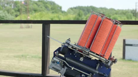 slow motion clay pigeon from the side. bench shooting on plates. v-log bench shooting on plates. automatic machine for throwing plates for shooting. throwing machine for bench shooting.