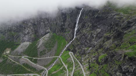 waterfall at trollstigen mountain pass in norway - aerial