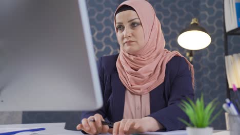 business woman in hijab is thinking about new projects and new ideas.