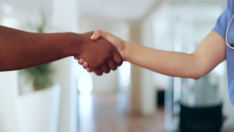 Hospital, nurse and patient shaking hands