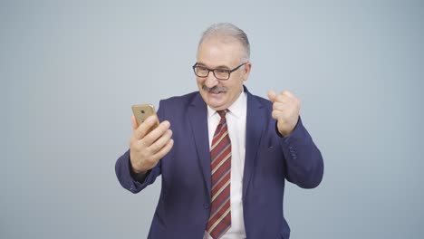 businessman rejoicing after receiving gospel.