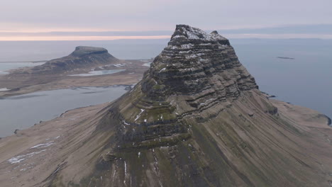 Drone-Shot-of-Kirkjufell-Hill-on-North-Coast-of-Iceland's-Snæfellsnes-Peninsula