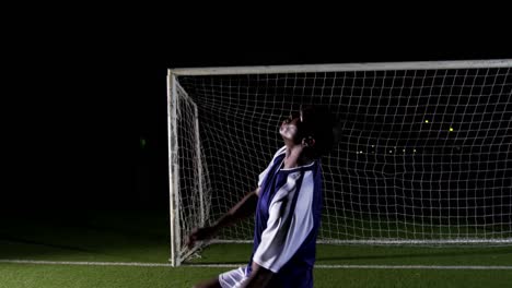 Soccer-player-kicking-the-ball-4k