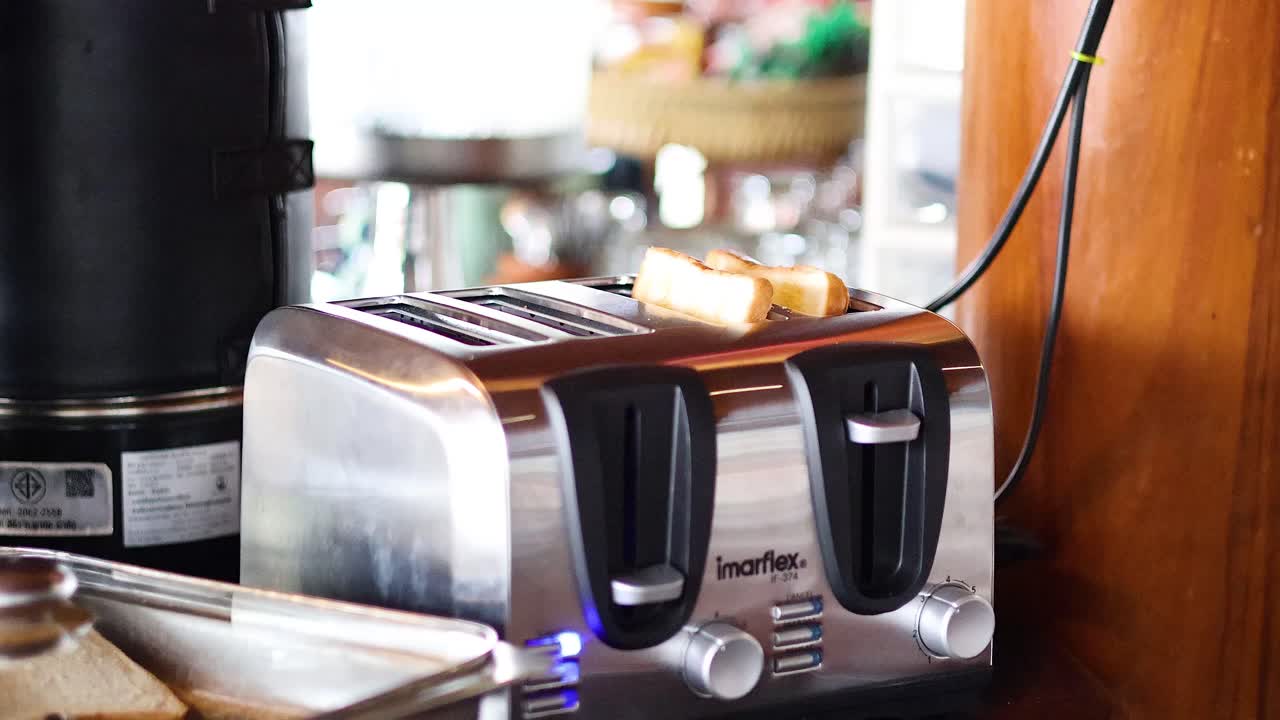 Bread slices popping from a toaster