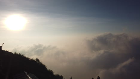 Early-morning-misty-timelapse-mountains-above-Kodaikanal,-Tamil-Nadu,-India