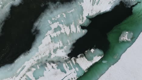 Aerial-Overhead-View-Of-Glacier-Lake-In-Switzerland