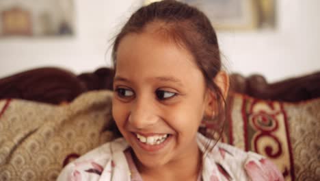 portrait of an indian child at home during coronavirus lockdown