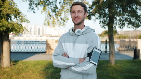 man in sportswear posing outdoors