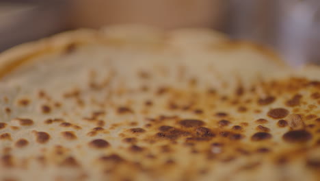 close-up of the texture of a freshly baked pancake on a plate