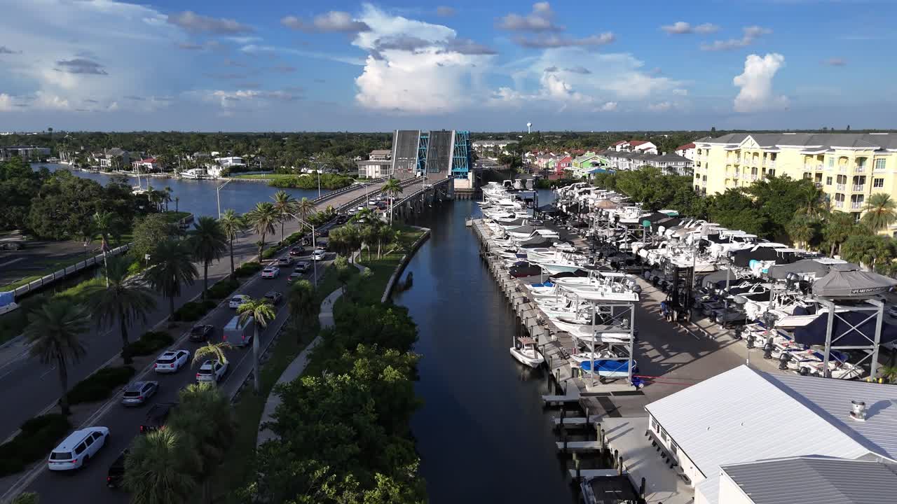low aerial toward Stickney Point Bascule Bridge, leaving Siesta Key, Island, Florida