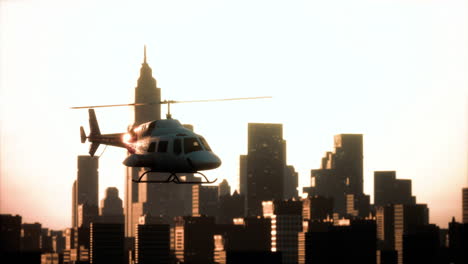 Silhouette-helicopter-at-city-scape-background