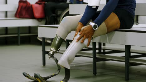 two disabled athletics relaxing in changing room 4k