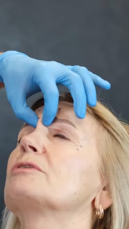 woman receiving cosmetic treatment for wrinkles