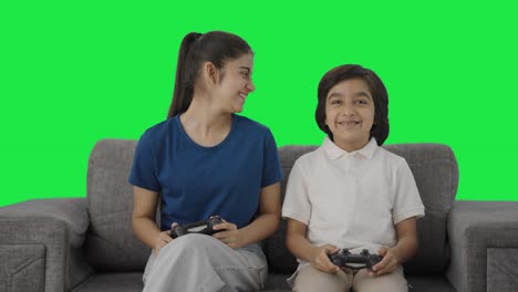 Indian-cousin-playing-video-games-happily-Green-screen