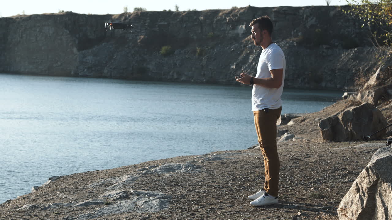 Man Flying a Drone Over a Quarry