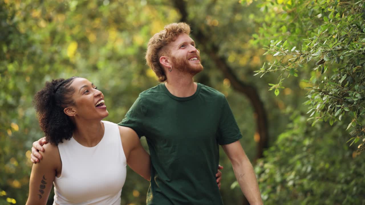 Couple Enjoying a Walk in the Forest