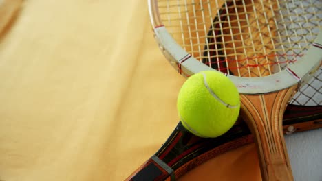 Tennis-ball-and-racket-on-white-background-4k