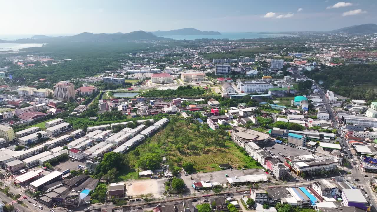 Drone flying to courthouse and government office in Phuket, Thailand. Aerial cityscape.