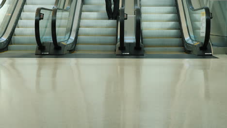 escalator in airport terminal passengers rush to their flights 01