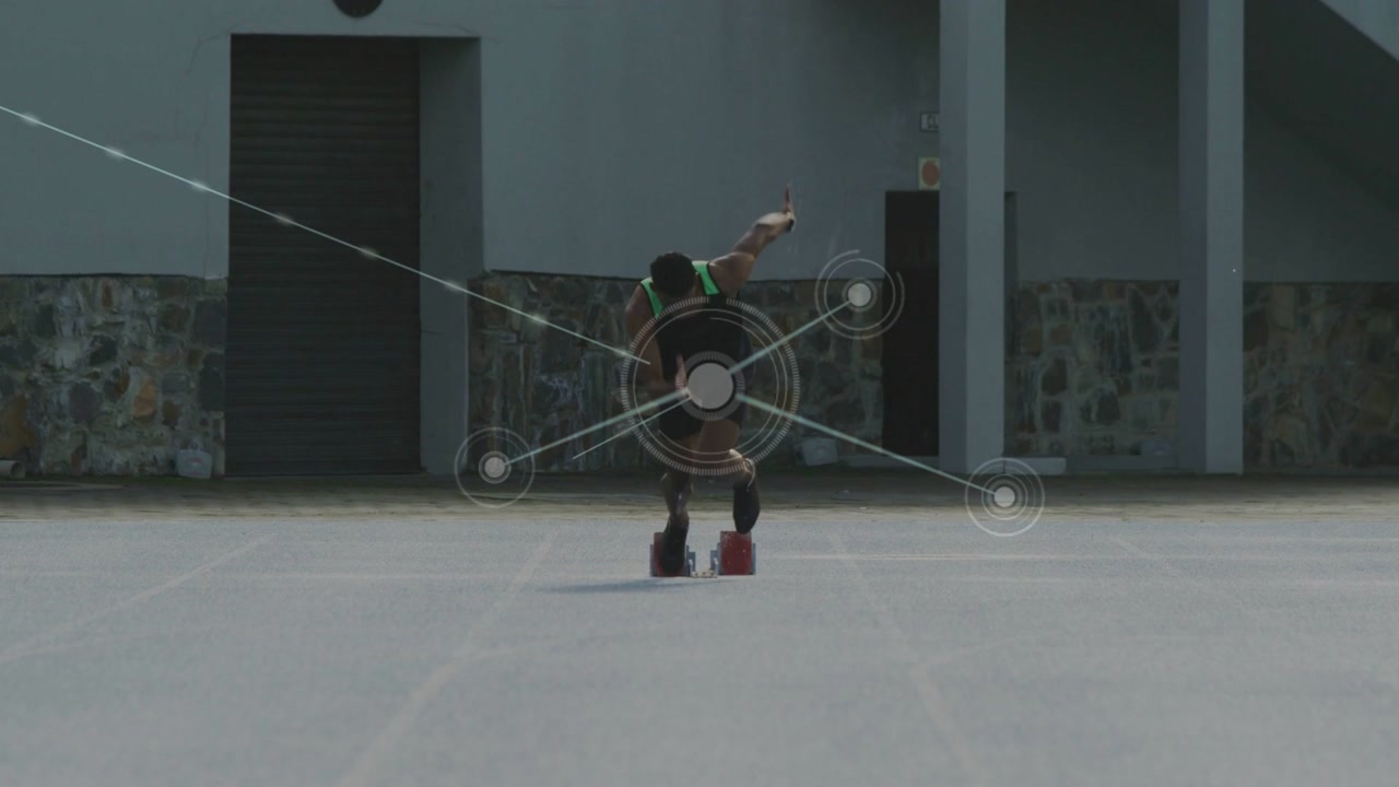 Male Athlete in Starting Blocks with Digital Network Overlay