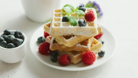 Waffles-on-plate-and-cup-of-coffee