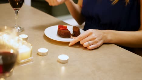 Woman-having-dessert-at-home-4k