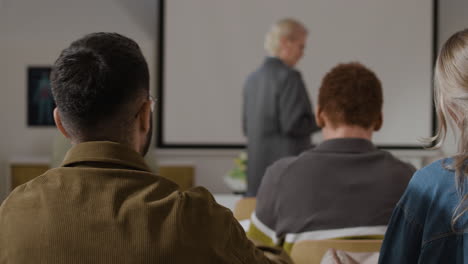 classroom lecture with students and teacher