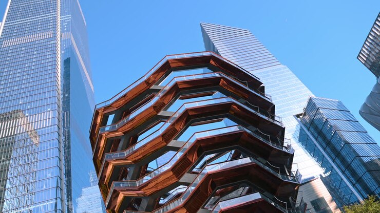 Visitor attraction of modern New York, USA. Low angle view at the Vessel Sculpture in Manhattan