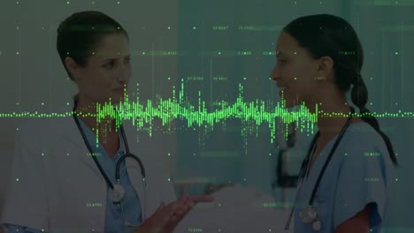 Animation-of-data-processing-over-diverse-female-doctors-talking