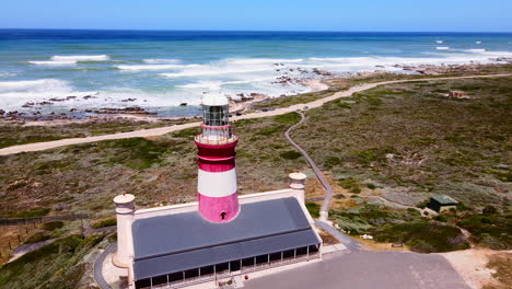 historic cape agulhas lighthouse on coastline maritime beacon