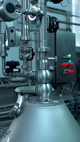 interior of dairy factory with fermentation tank. technology equipment at dairy farm. sterile production vertical video